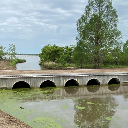 A culvert/bridge made from CORLIX corrugated aluminum pipe