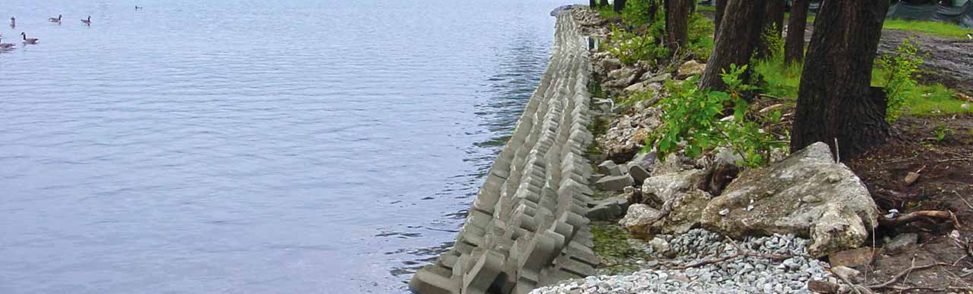 A-Jacks concrete armor units protect a lake embankment from erosion.